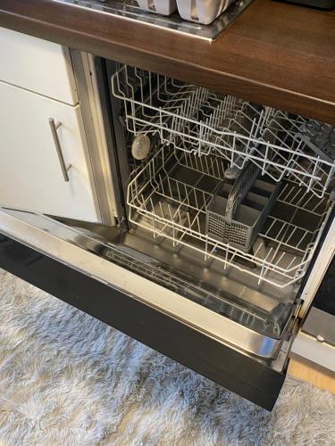 Una cocina o kitchenette en Moderne Wohnung Nähe Hauptbahnhof Linz