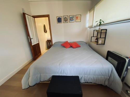 En eller flere senge i et værelse på Departamento a estrenar