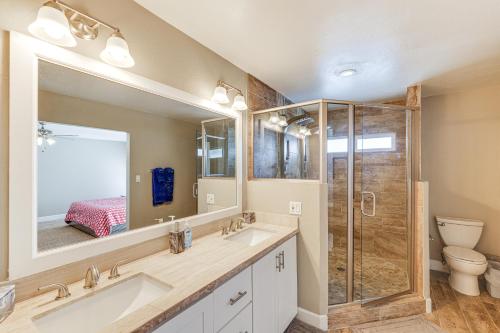 a bathroom with a sink and a shower and a toilet at 12 Mi to Old Town! Home with Furnished Patio in Phoenix