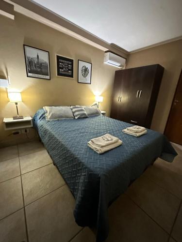 Departamento Mendoza Centro A tesisinde bir odada yatak veya yataklar