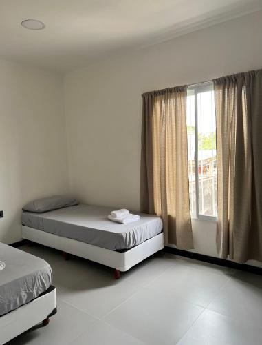 Postel nebo postele na pokoji v ubytování Duplex China