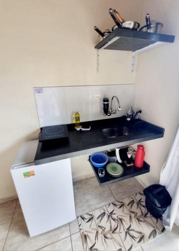 Kuchyň nebo kuchyňský kout v ubytování Burung Flats Itamambuca - Hospedagem com vista para o mar