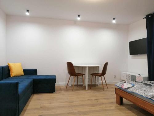 Televisyen dan/atau pusat hiburan di Apartament.Ul.Krótka