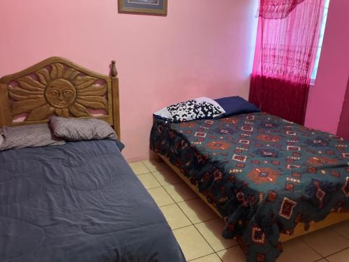 um quarto com duas camas num quarto em Blanquita Apartment em El Sauzal