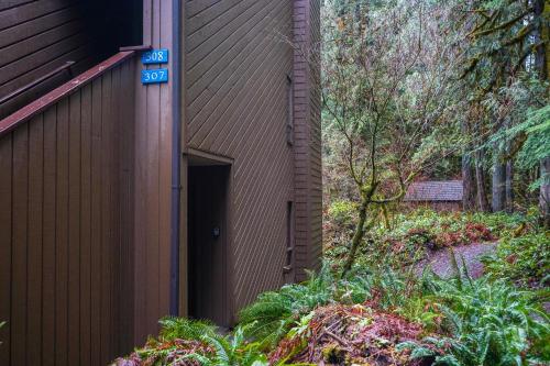 a building with a sign on the side of it at Snowater Nook in Deming