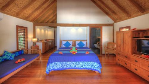 Katil atau katil-katil dalam bilik di Etu Moana Boutique Beach Villas - Adults Only