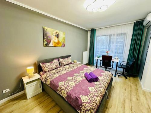 En eller flere senge i et værelse på Zen Central Studio