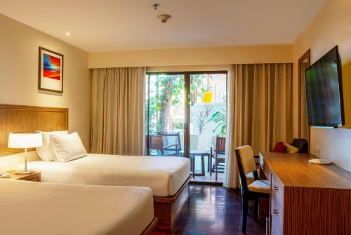 Postel nebo postele na pokoji v ubytování Holiday Inn Resort Phuket Surin Beach by IHG