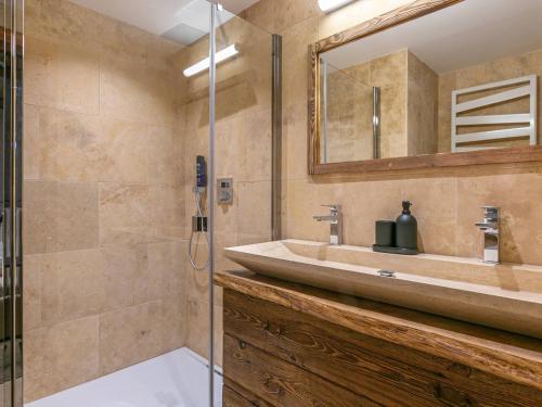 a bathroom with a sink and a shower at Appartement Val-d'Isère, 5 pièces, 8 personnes - FR-1-694-345 in Val-d'Isère