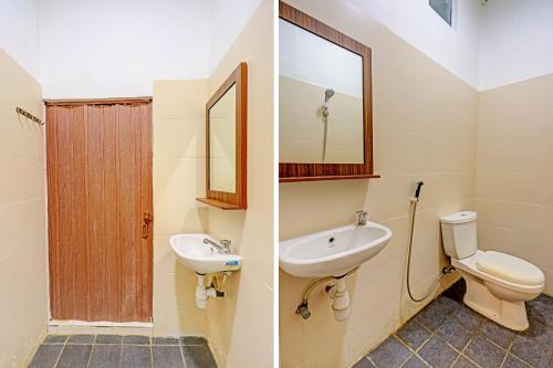 y baño con lavabo, aseo y espejo. en Collection O 91499 John Lebron House, en Sagulung