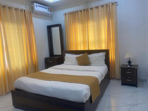 Katil atau katil-katil dalam bilik di Palliyathayil home stay