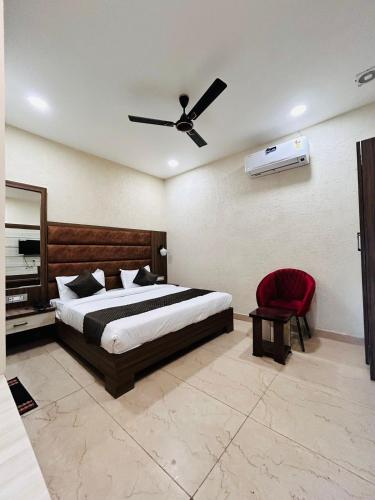Cama o camas de una habitación en HOTEL MONGA 5 Minutes From Golden Temple