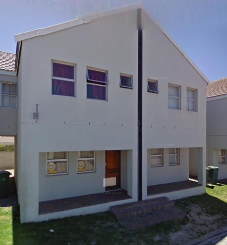 a large white building with a lot of windows at Saldanha BLUEWATER BAY APARTMENT in Saldanha