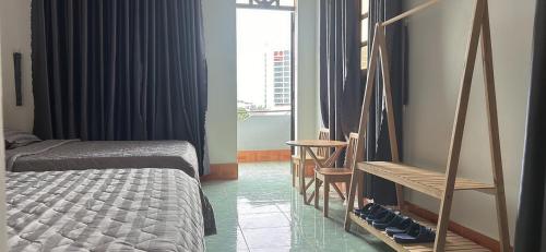Katil atau katil-katil dalam bilik di Hotel Minh Vy