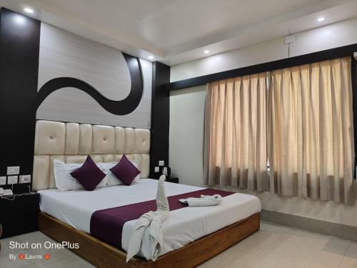 Krevet ili kreveti u jedinici u objektu Hotel Rupasi Bangla 2, New Digha - Near Sea Beach