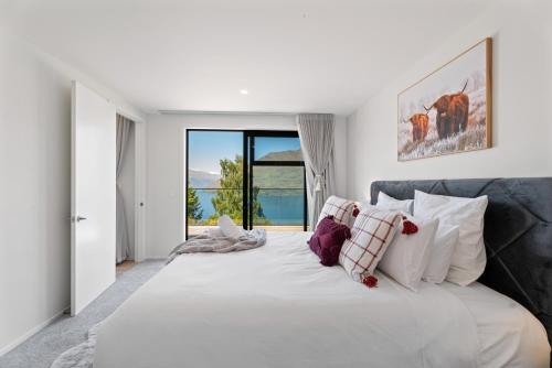 Giường trong phòng chung tại Modern, Plush & Picturesque - Wynyard Top