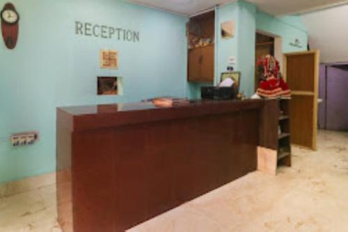 an office with a reception desk in a room at Hotel Maitry,Cuttack in Cuttack