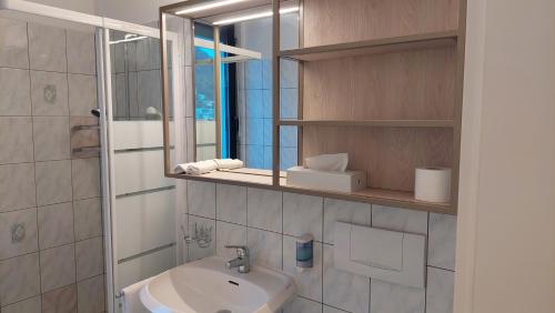 Koupelna v ubytování Hotel Nessi Locarno