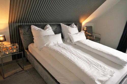 Postel nebo postele na pokoji v ubytování Küstenblick 2