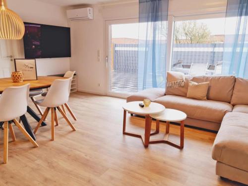 Posezení v ubytování Wilde Brise 2 Topniveau in Toplage mit Sauna