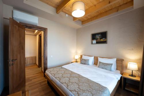 Ein Bett oder Betten in einem Zimmer der Unterkunft Serodani