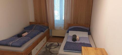 Postel nebo postele na pokoji v ubytování Villa SCS Nähe