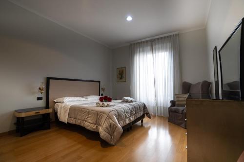 Una cama o camas en una habitación de Le Cupoline