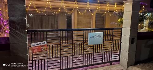a balcony of a building with signs on it at Casa Coutinho in Porvorim