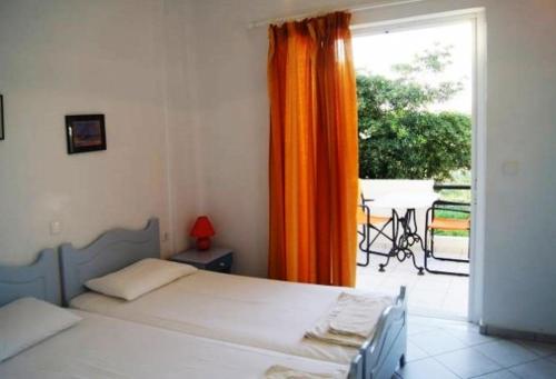 Postel nebo postele na pokoji v ubytování Silvi Mari Apartments