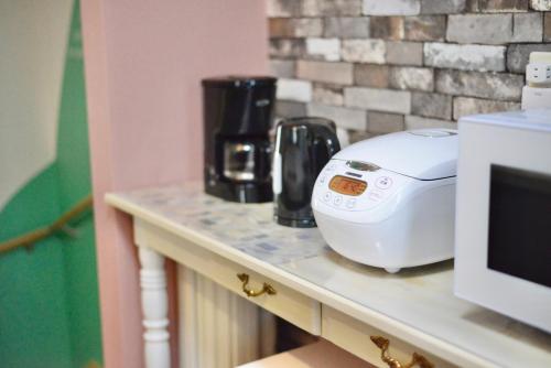 Kuchyň nebo kuchyňský kout v ubytování 新規物件 朝日が綺麗 海が目の前 最大6名宿泊可能 Sweet Home