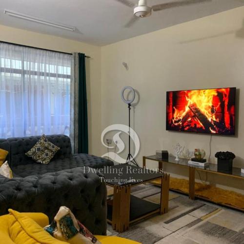Телевизия и/или развлекателен център в Bamburi comfy & luxurious home