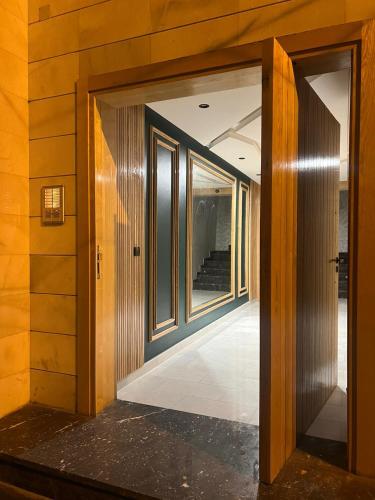 an open door in a building with a hallway at Escalade BAYTI 2 in El Jadida