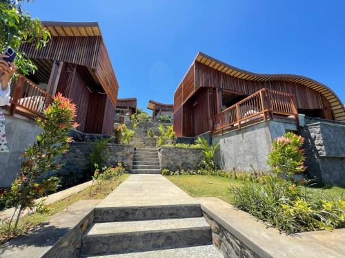 a set of stairs leading to a house at The Angsa villas in Amed