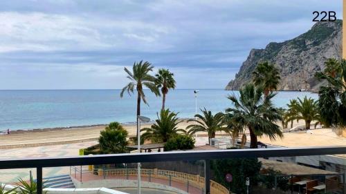 a view of the beach from the balcony of a resort at TIMORA SEA VIEW New Apart' Hipocampos in Calpe