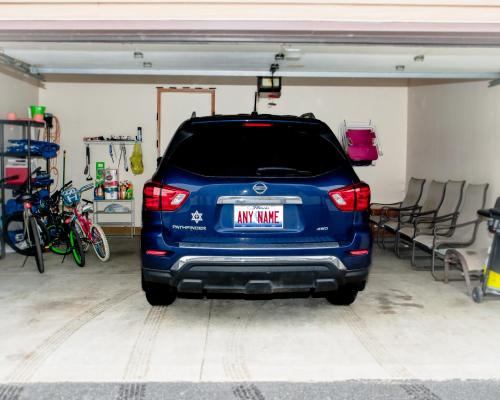 a blue car is parked in a garage at Beach Lake Michigan King Bed Pet Friendly in Kenosha