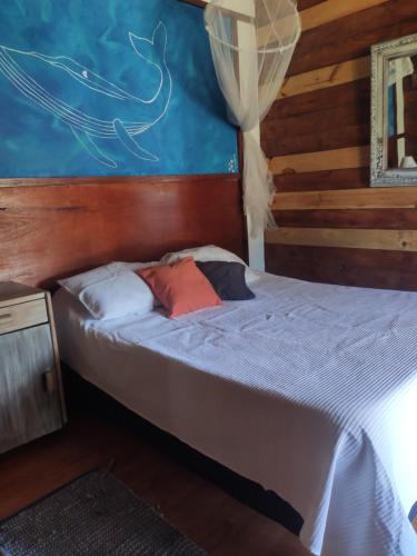 Giường trong phòng chung tại Cabaña La Federica