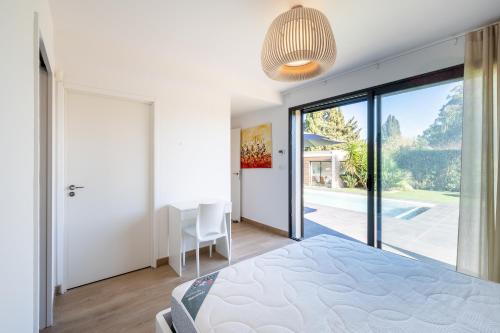 Ένα ή περισσότερα κρεβάτια σε δωμάτιο στο Villa Alicia