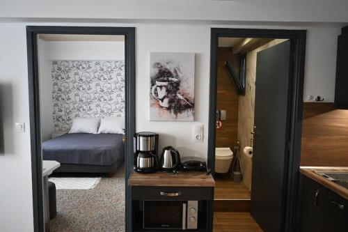 เตียงในห้องที่ Haris 303 Apartment by VPN Accomodation