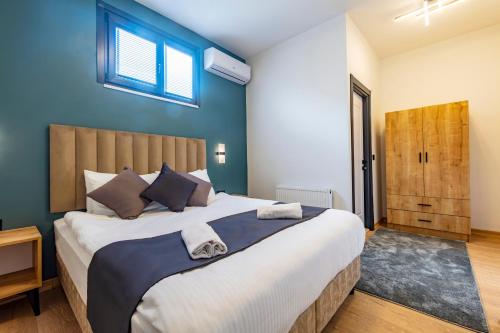 Katil atau katil-katil dalam bilik di Mia Mia Suites