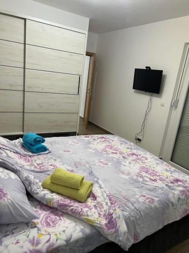 Postel nebo postele na pokoji v ubytování Apartmani Povlen 52