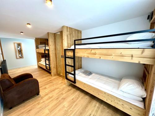 Appartements Chalet Lauranoure Centre Stationにあるベッド