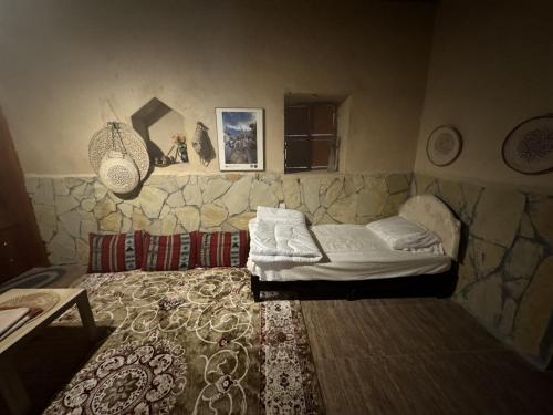 Postel nebo postele na pokoji v ubytování Fanja Heritage House