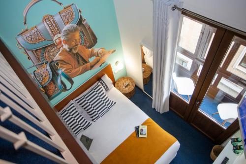 Ένα ή περισσότερα κρεβάτια σε δωμάτιο στο Casual Ilbira Granada