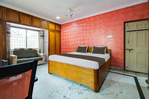 Uma cama ou camas num quarto em OYO Flagship 81246 Hotel Palm Exotica