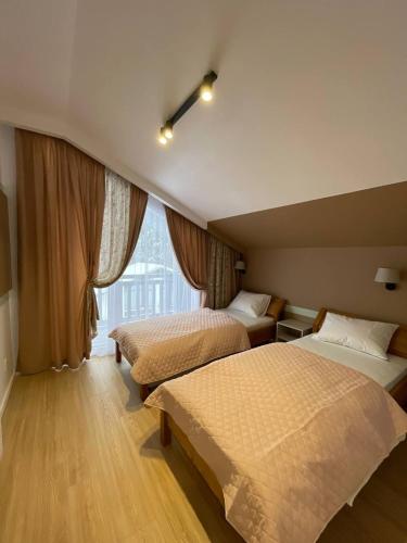 Ένα ή περισσότερα κρεβάτια σε δωμάτιο στο Horizon Apartmens