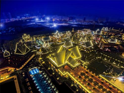 an aerial view of a city at night at Mangrove Tree Resort World Sanya Bay-Kapok in Sanya