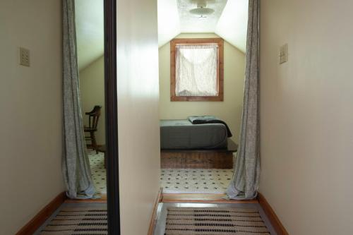 Katil atau katil-katil dalam bilik di Cozy Tiny Haus Apt