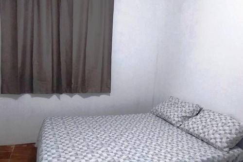 Un pat sau paturi într-o cameră la Casa da Tere