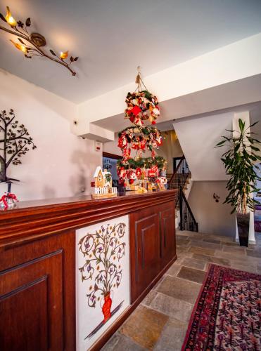 a christmas tree on top of a counter at Erofili Hotel & Suites in Portaria