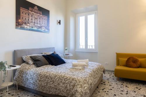 Кровать или кровати в номере A due passi dal Colosseo